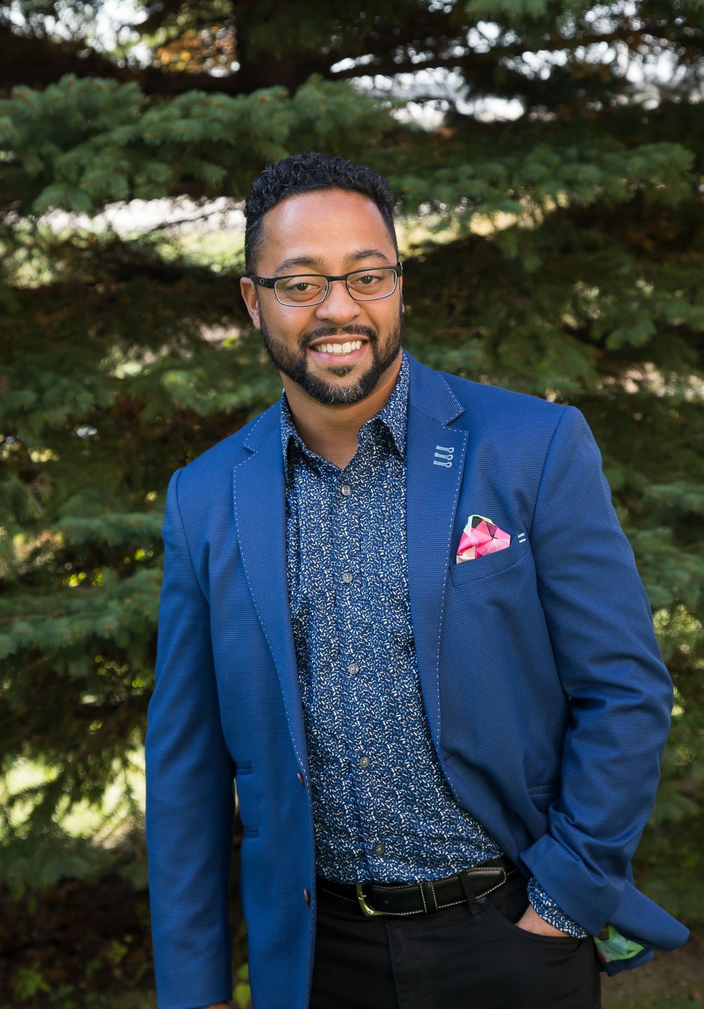 Shawn Gale smiling outdoors in a blue jacket